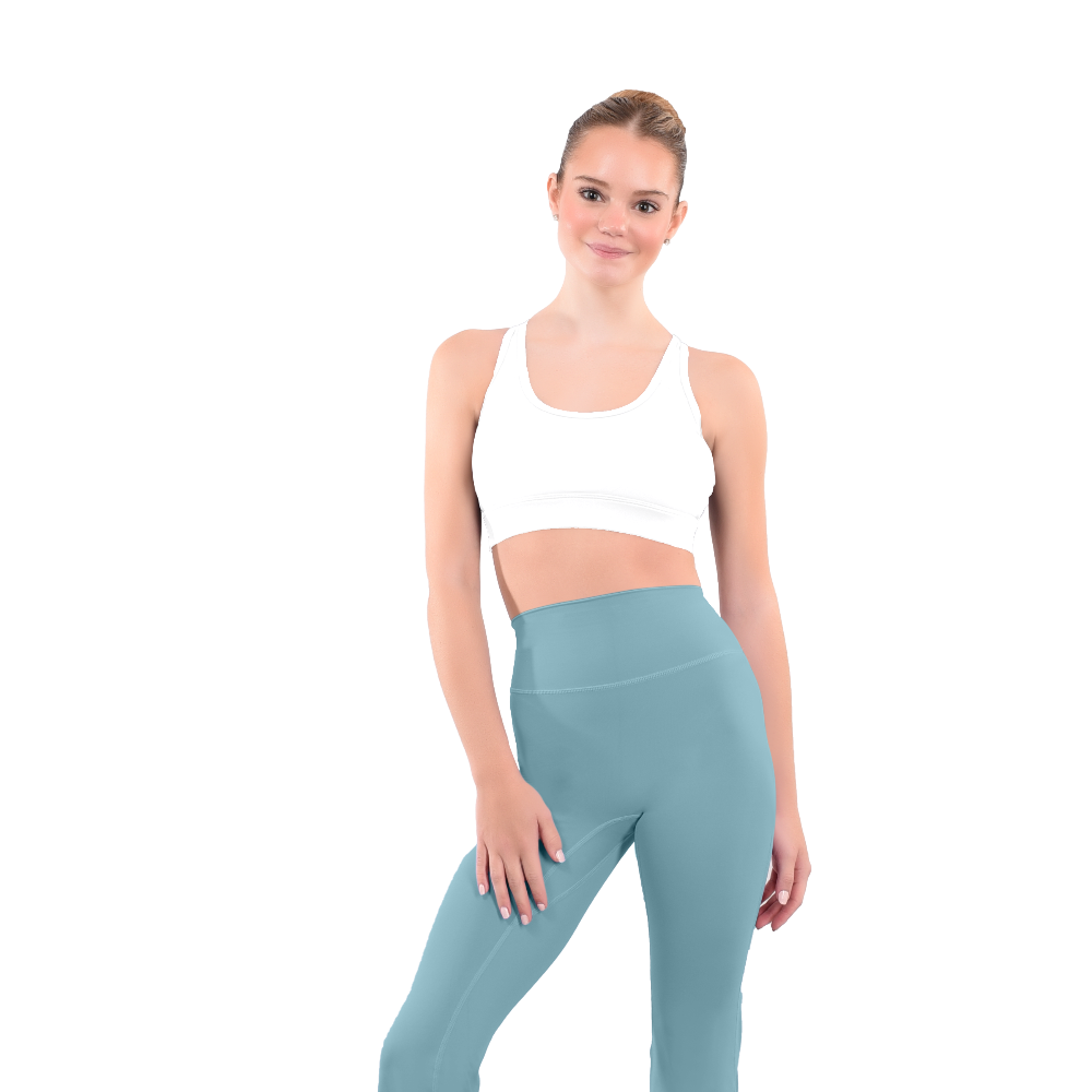 dancer in white sports bra and avocado green high rise flared stretch fit pants