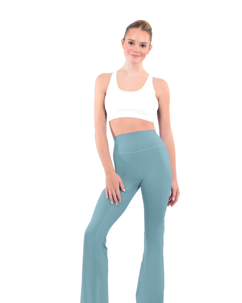 dancer in white sports bra and avocado green high rise flared stretch fit pants