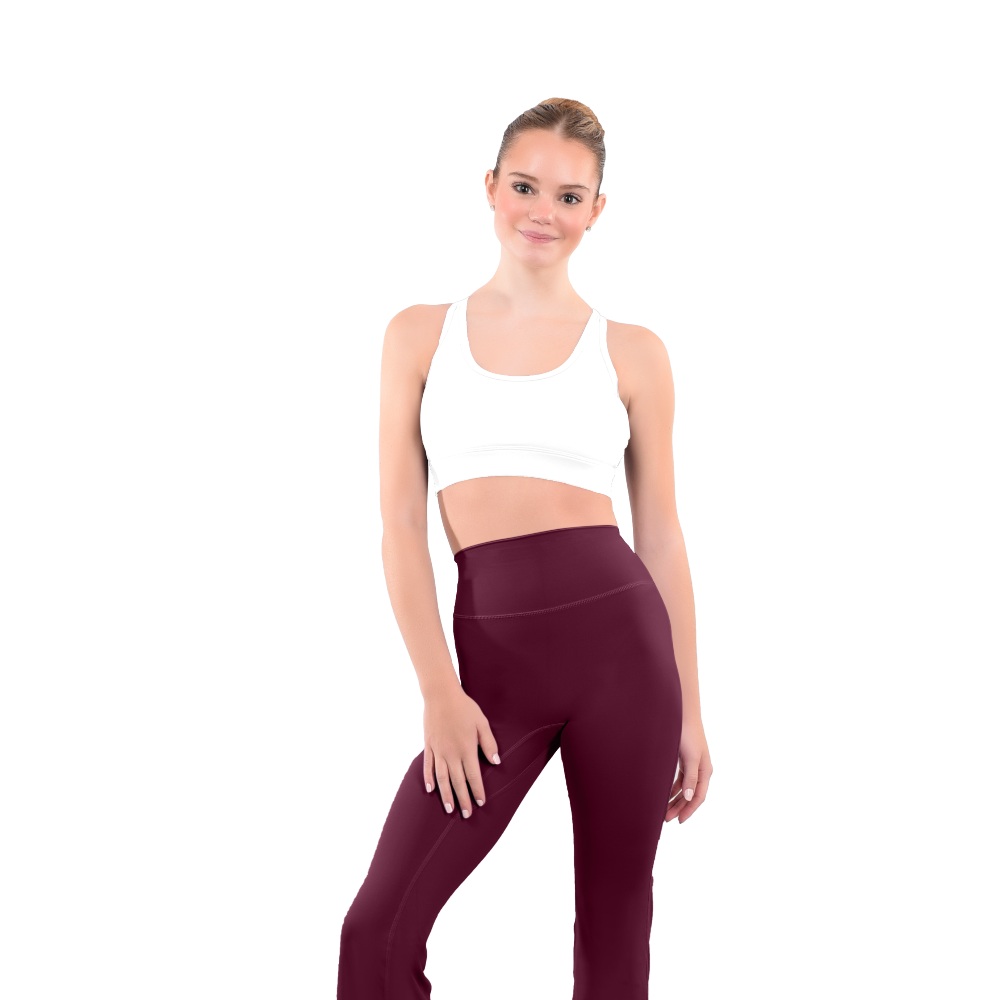 dancer in white sports bra and burgundy high rise flared stretch fit pants