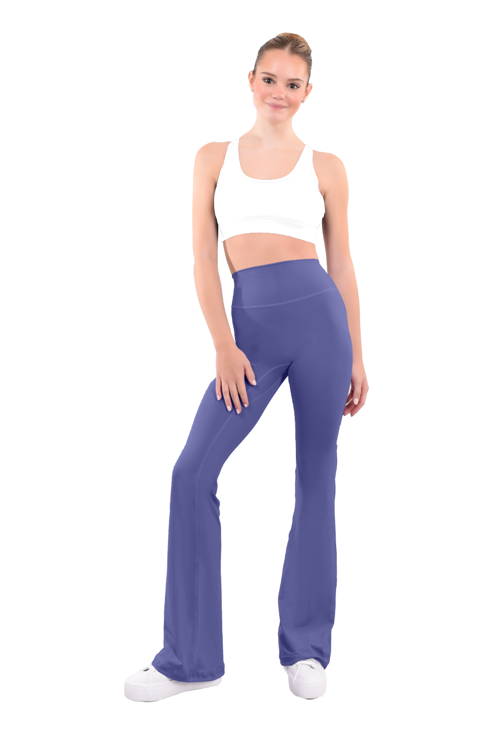 dancer in white sports bra and comet high rise flared stretch fit pants