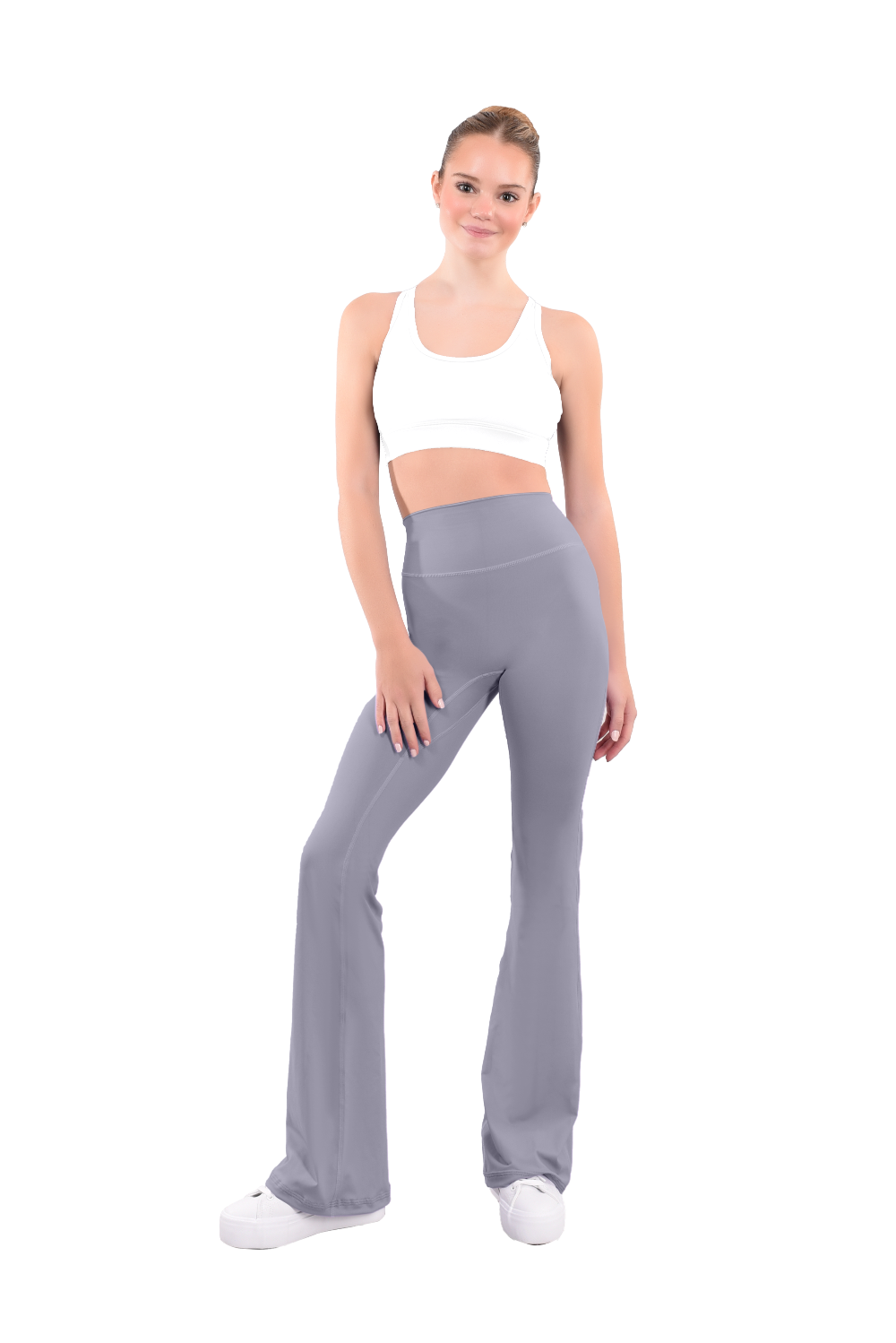 dancer in white sports bra and dolphin gray high rise flared stretch fit pants
