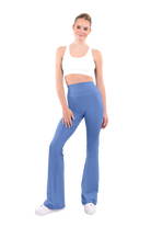 dancer in white sports bra and Glacier blue high rise flared stretch fit pants