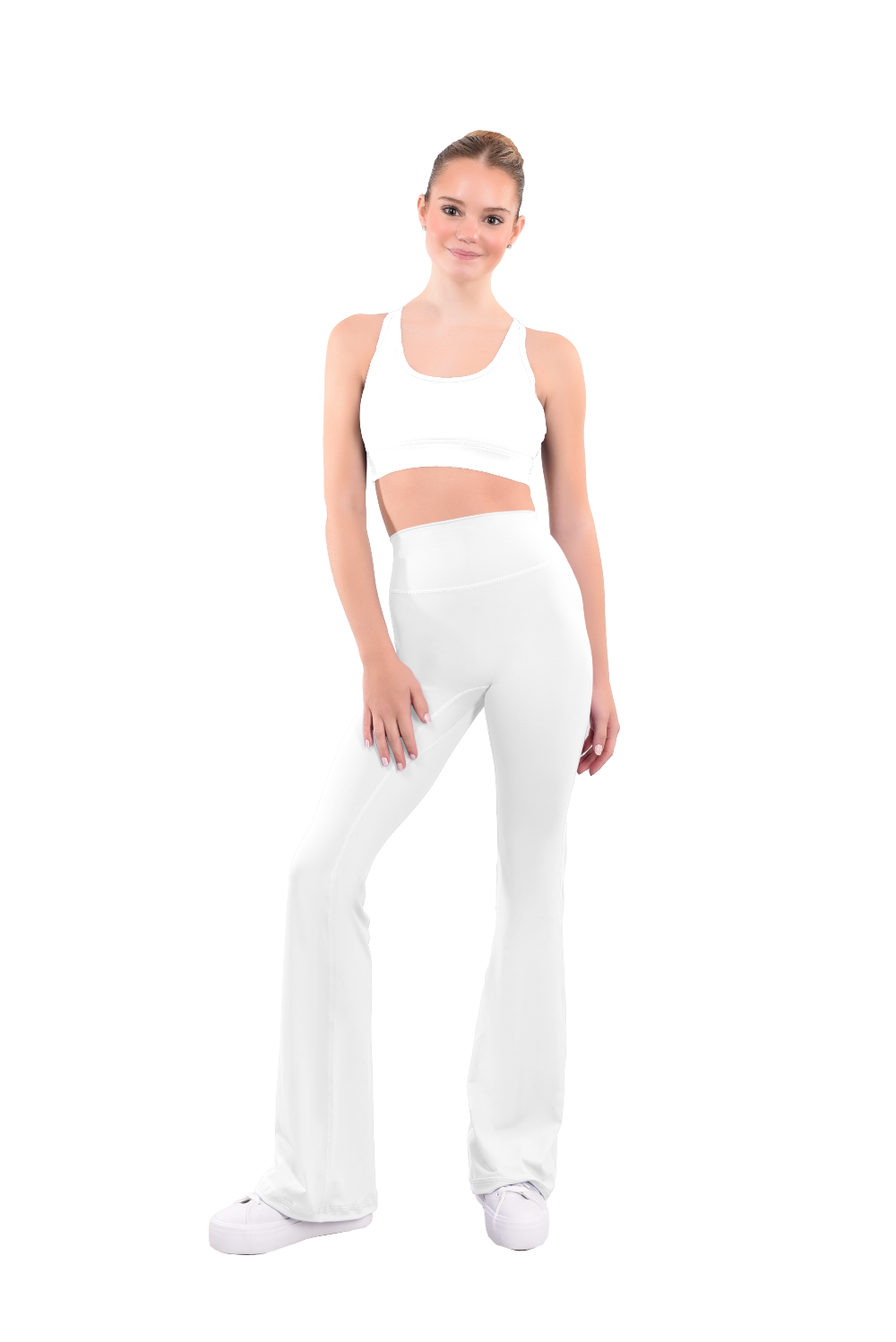 dancer in white sports bra and white high rise flared stretch fit pants