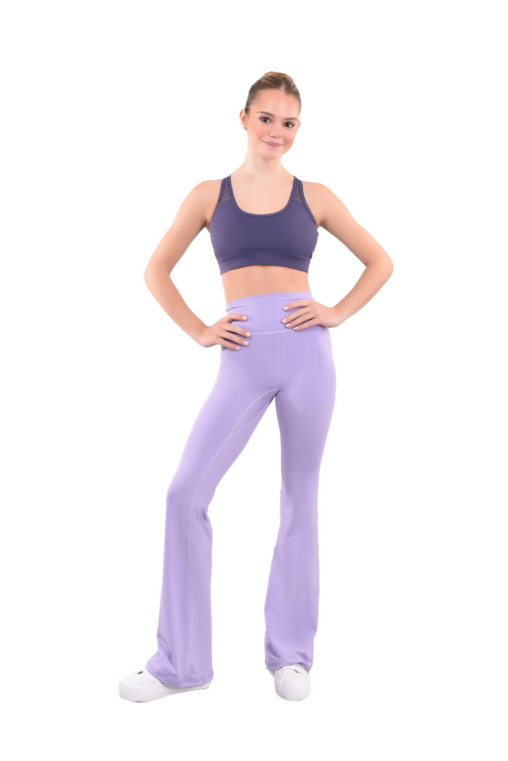 dancer in purple sports bra and lavender high rise flared stretch fit pants